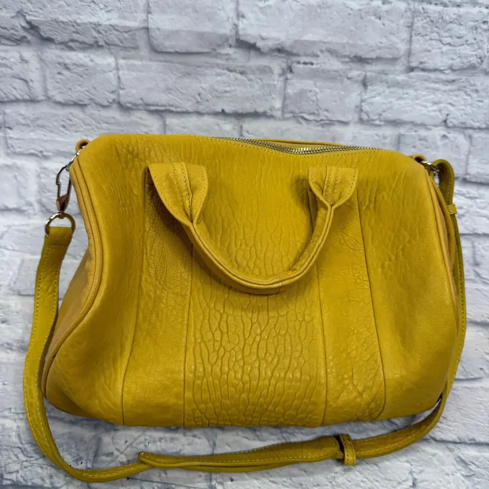Alexander Wang Rocco Duffel Bag Mustard Yellow Pebbled Leather Studded Bottom